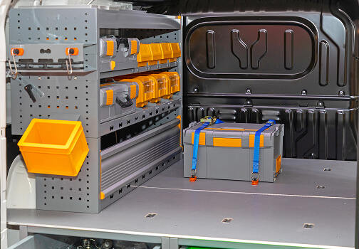 Transport Box Load Secured With Ratchet Straps in Mobile Workshop Van 1