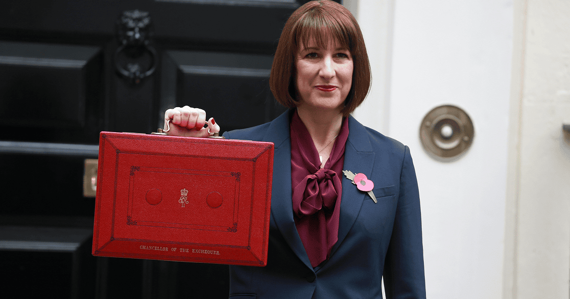 Rachel Reeves holding red suitcase on budge day 2025
